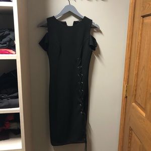 Black bandage dress with the string detail.